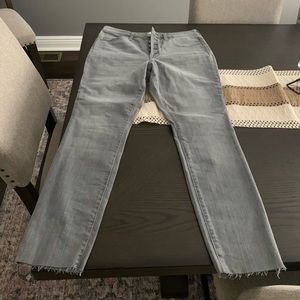 High rise skinny raw ankle jeans